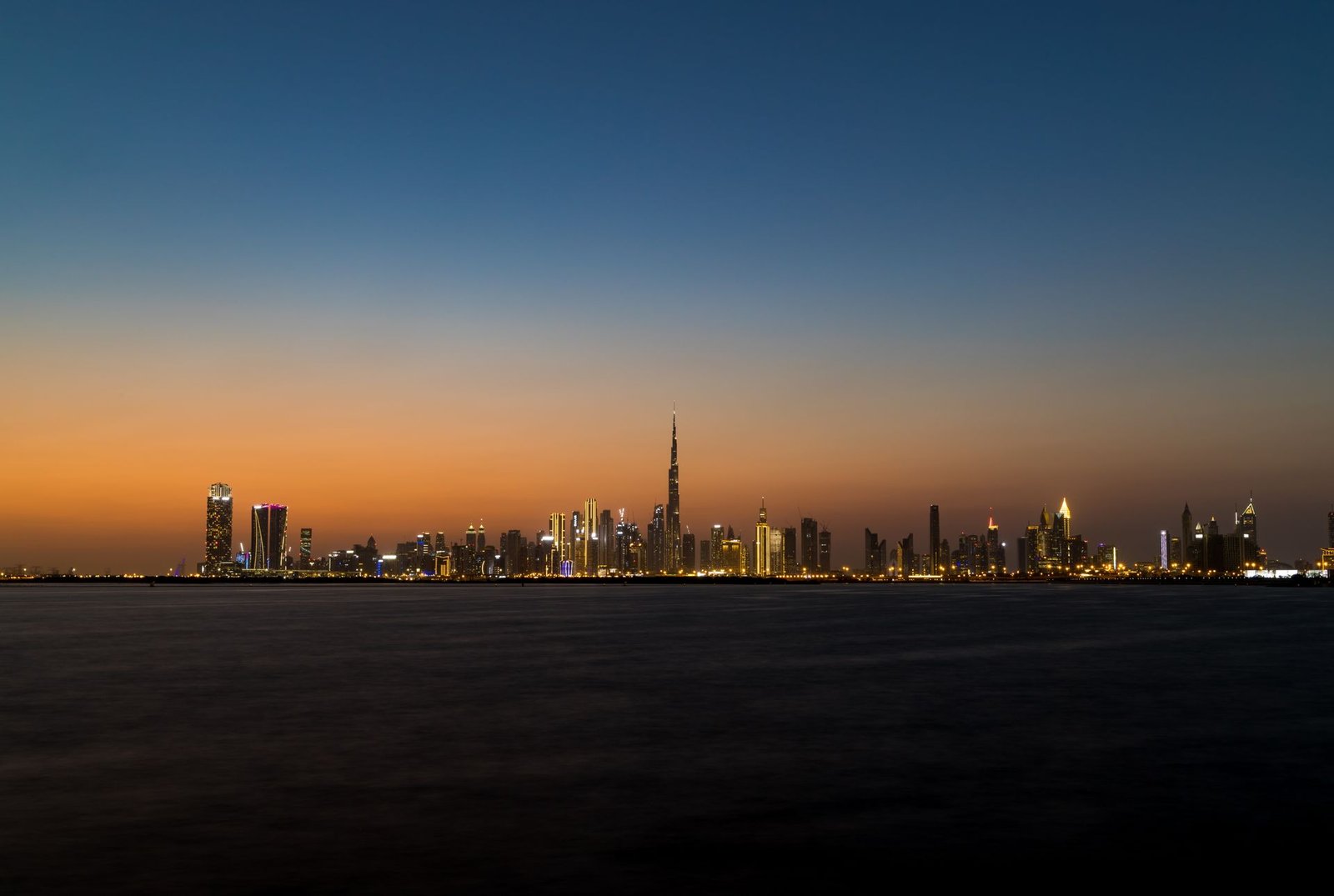 Dubai skyline at twilight with the Burj Khalifa